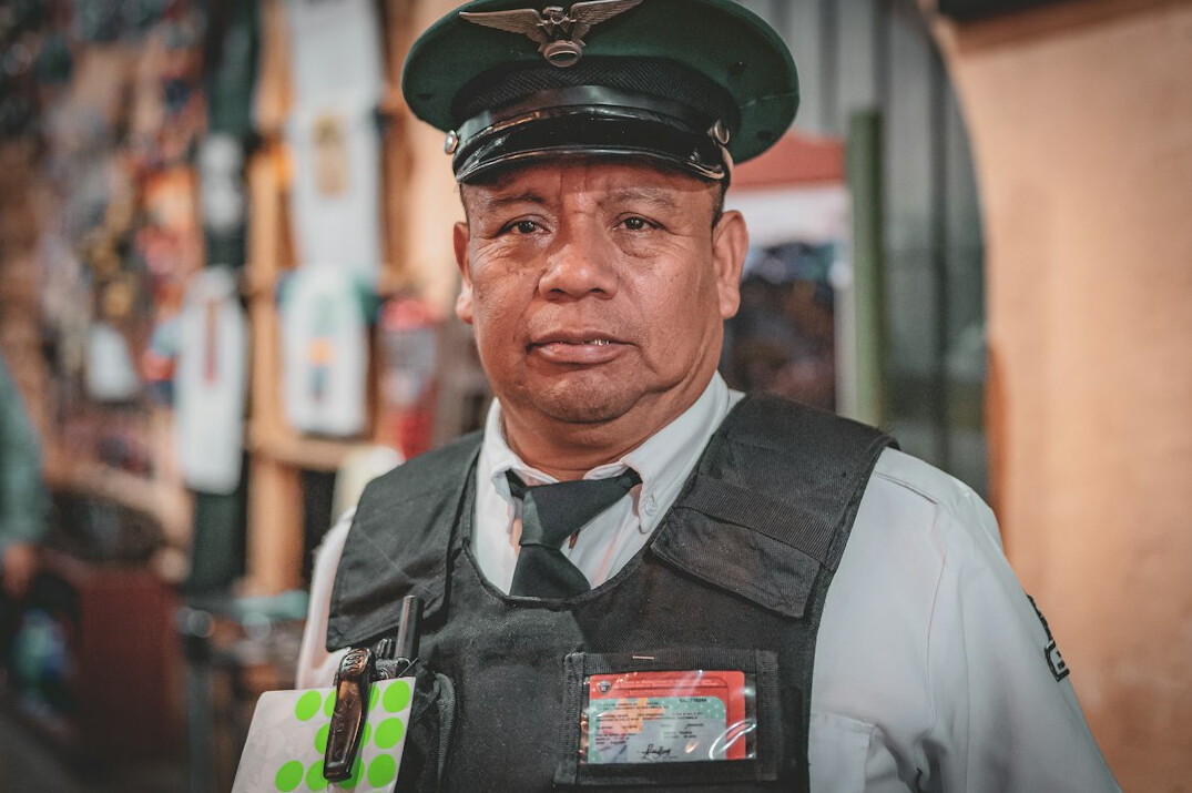 store detective monitoring customers
